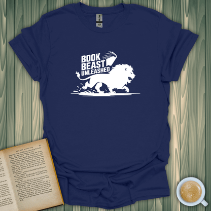 Book Beast Unleashed T-Shirt for book lovers, featuring a fierce lion design in white on navy blue fabric.