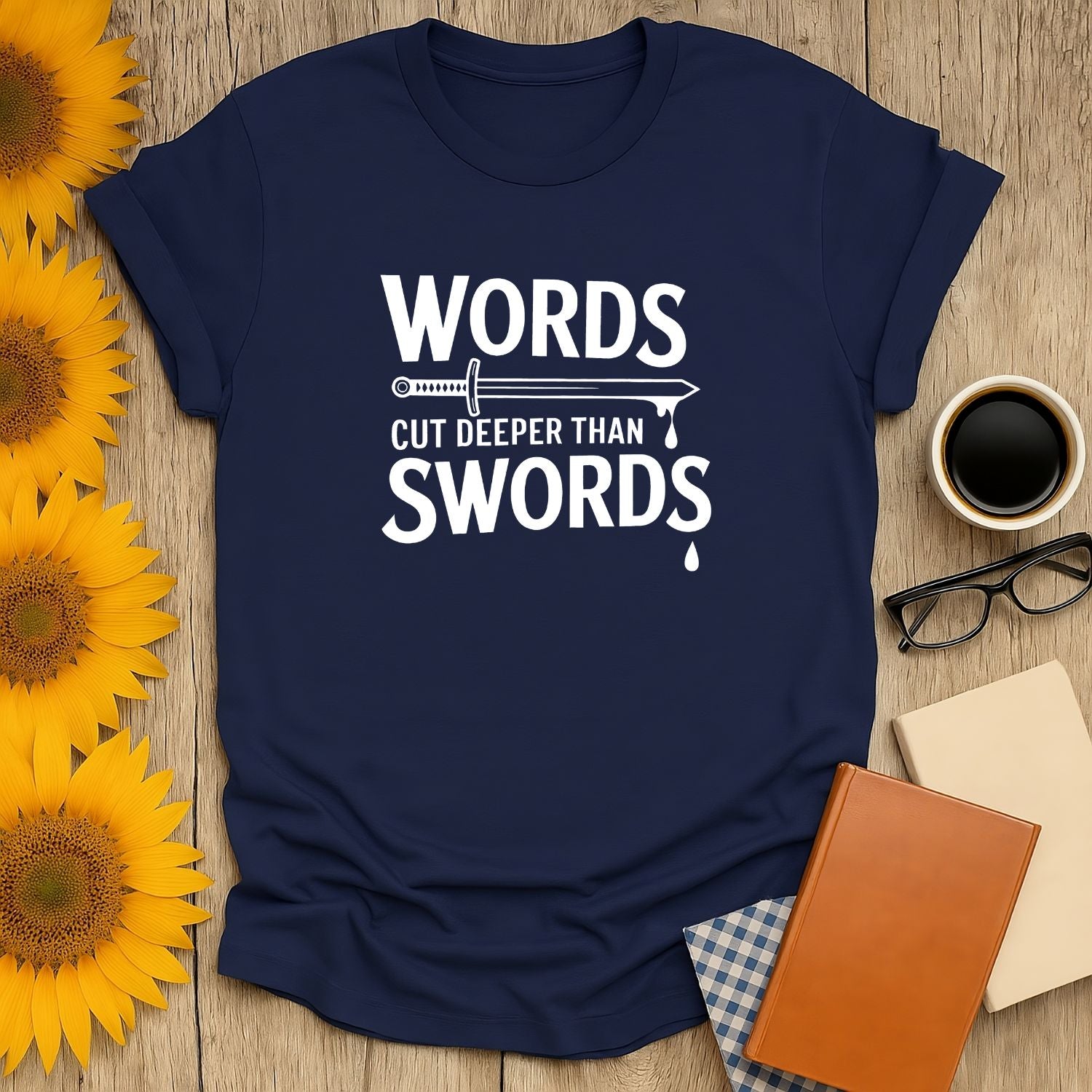 Words Cut Deeper Than Swords funny reading tee on navy shirt, perfect for book lovers who enjoy cats and coffee.
