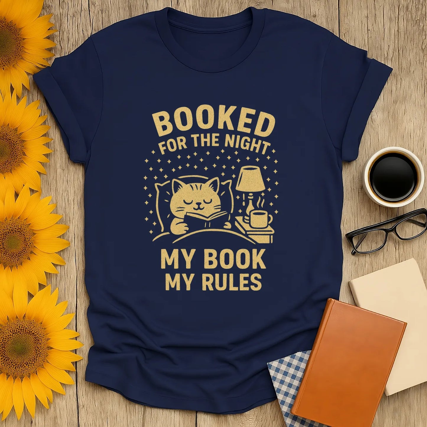 Cozy Booked for the Night t-shirt featuring a cat with a book and coffee, perfect gift for cat-loving readers.