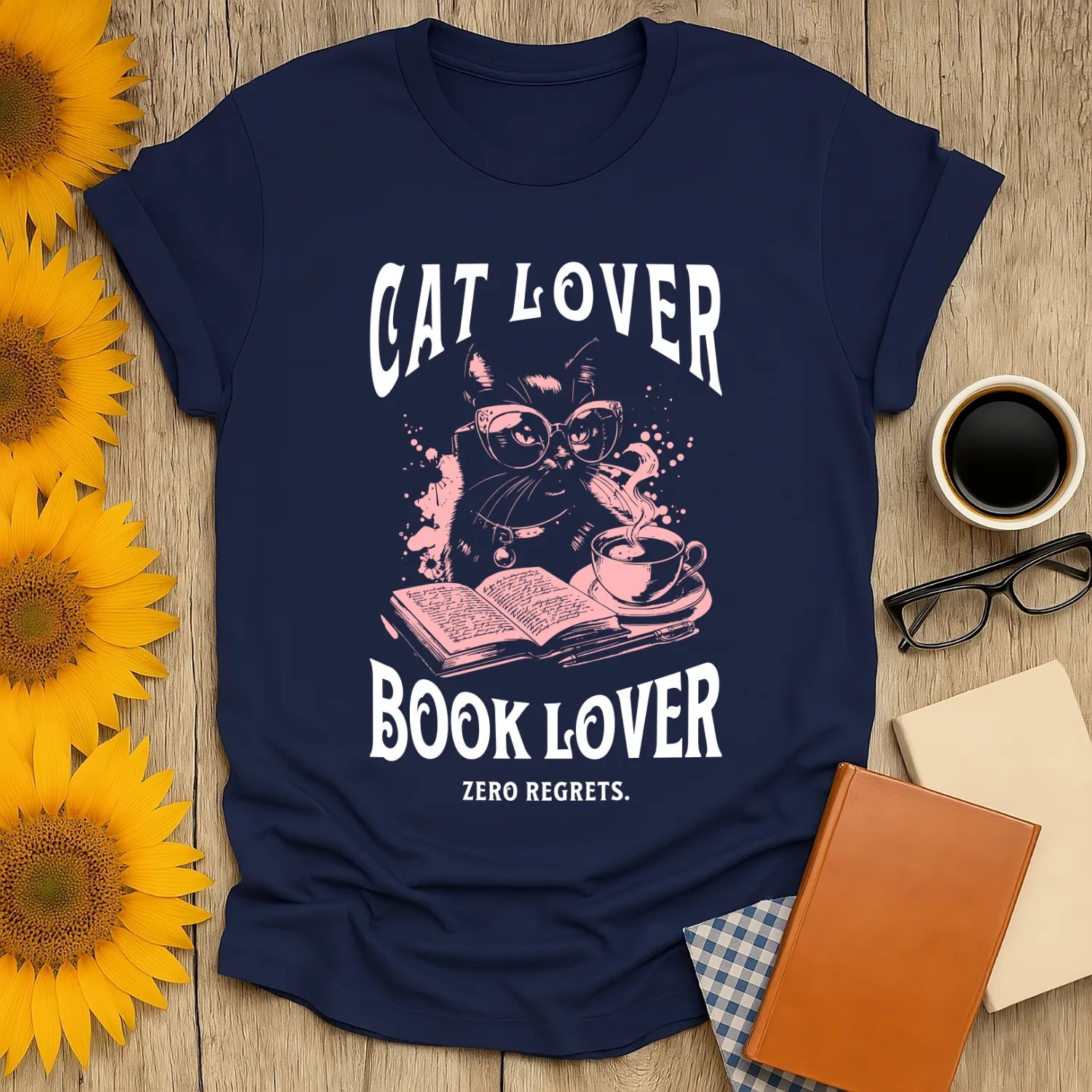 Cat & Book Lover T-Shirt featuring a cool cat in glasses, open book, and coffee cup, perfect for cozy reading days.