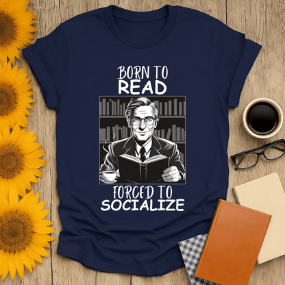 Born to Read, Forced to Socialize T-Shirt for book lovers, featuring a smiling character with books in a stylish design.