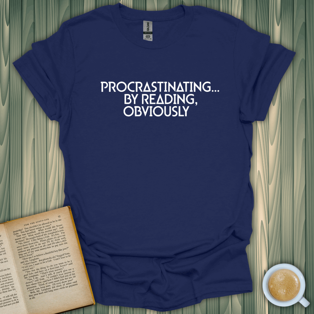 Navy blue t-shirt with 'Procrastinating... By Reading, Obviously' text, perfect for book lovers.