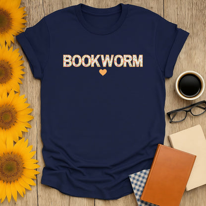 Cozy navy bookworm t-shirt with heart design, perfect gift for book lovers who adore cats, coffee, and literary humor.