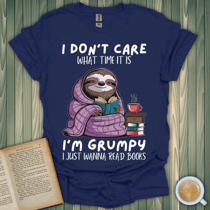 Grumpy sloth graphic t-shirt for book lovers, featuring whimsical design that says 'I’m Grumpy, I just wanna read books'.