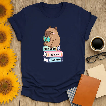 Capybara Reader T-Shirt featuring a cute capybara reading on a stack of books, perfect for book lovers and introverts. 📖
