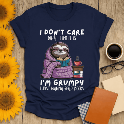 Grumpy sloth book lover t-shirt with fun design, perfect for cozy reading days. Made from 100% ring-spun cotton.