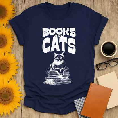 Books & Cats Club T-Shirt featuring a cat on a stack of books, perfect for cozy book lovers and cat enthusiasts.