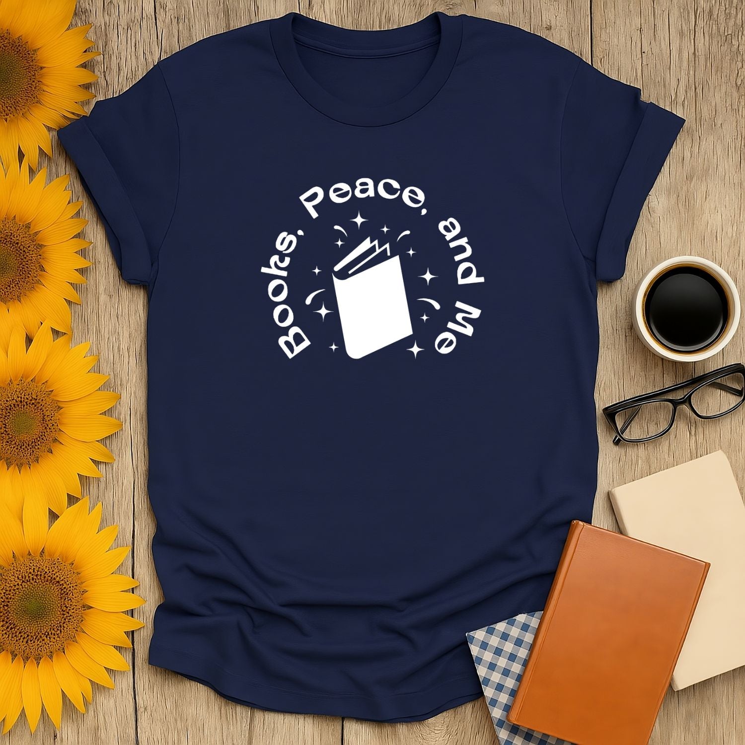 Navy unisex tee featuring 'Books, Peace, and Me' with a whimsical book illustration, perfect for cozy reading lovers.
