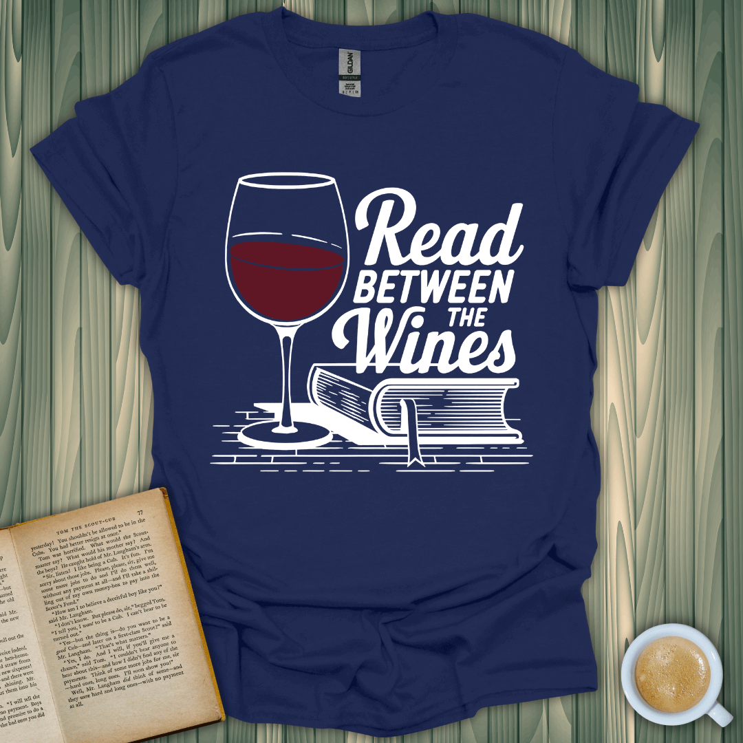 Unisex 'Read Between the Wines' T-Shirt for book lovers, featuring a wine glass and stacked books design.