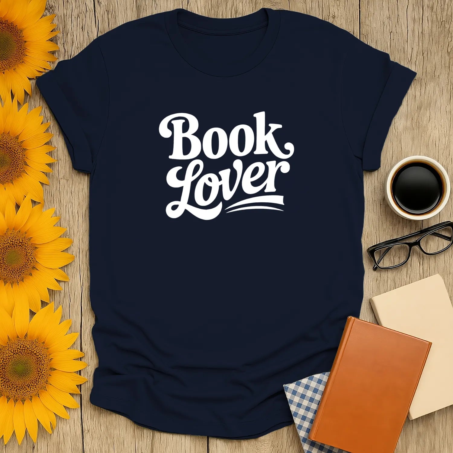 Navy blue Book Lover T-shirt for cozy reading, perfect gift for cat, coffee, or tea lovers. Ideal funny reading tee for bookworms.