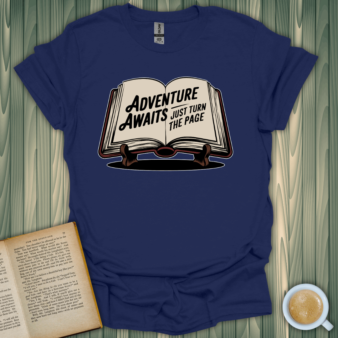 Adventure Awaits T-Shirt for book lovers, featuring a graphic of an open book, made of 100% cotton.