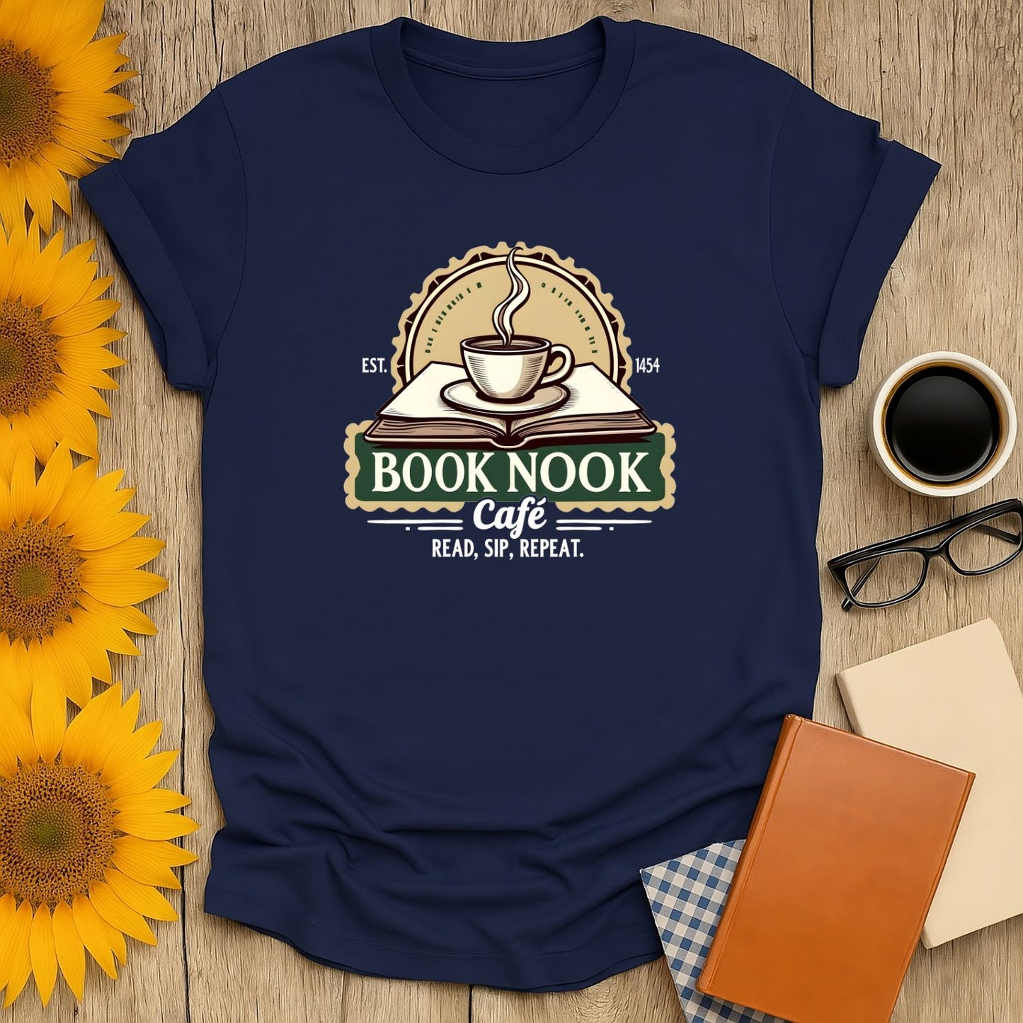 Cozy Book Nook Vibes T-Shirt featuring a steaming coffee cup on a book; perfect gift for cat lovers and readers.
