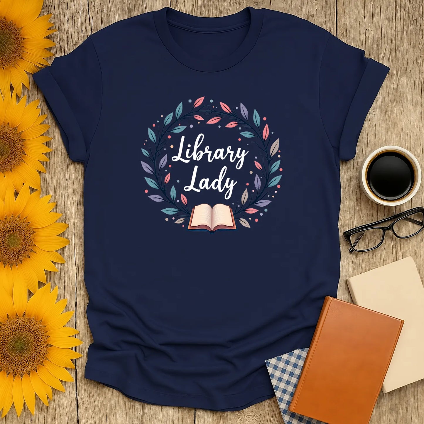 Cozy Library Lady T-Shirt with book illustration, perfect for book lovers, cat fans, and coffee enthusiasts.