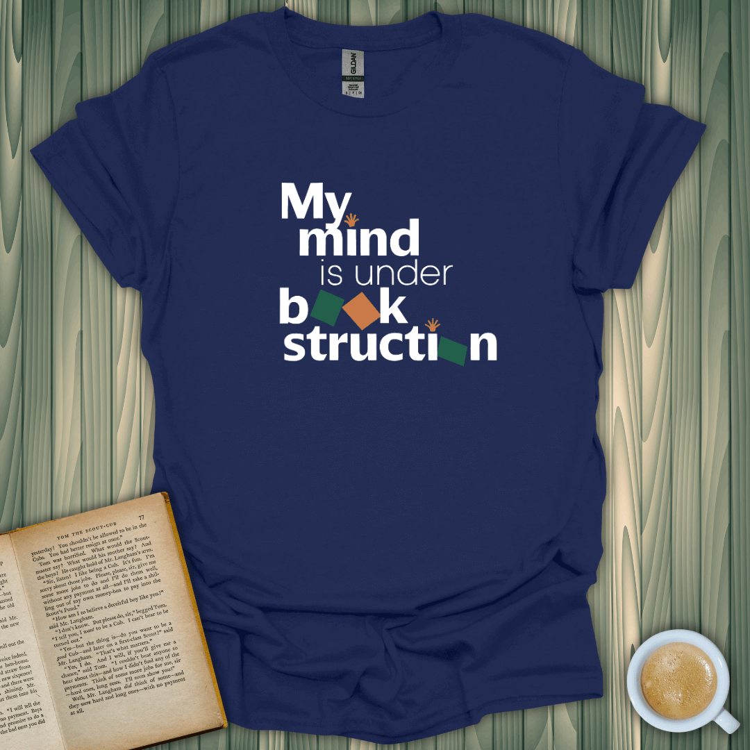 Mind Under Book-struction T-Shirt for book lovers, crafted from soft ring-spun cotton in a comfy unisex fit.