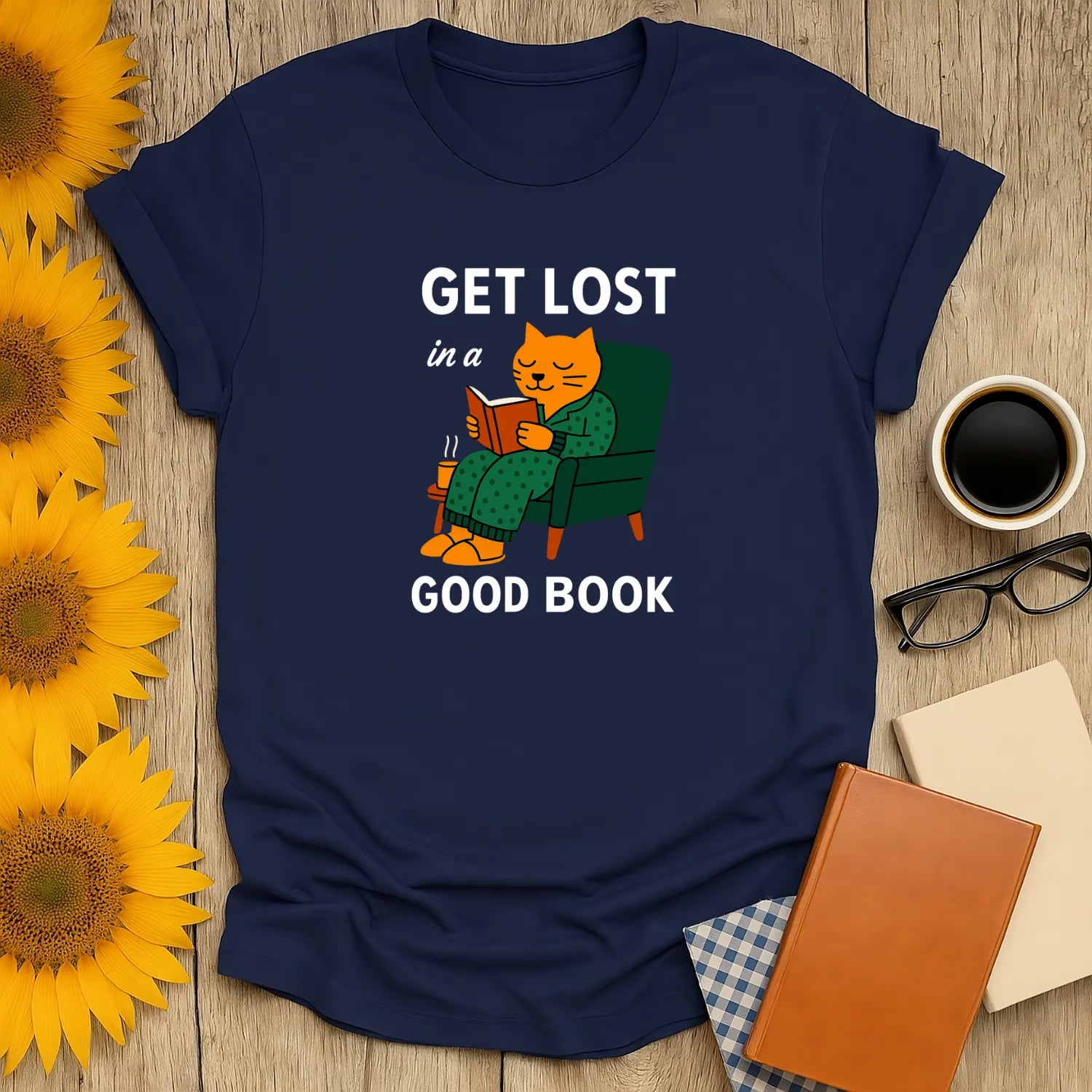 Cozy cat reading shirt with the text 'Get Lost in a Good Book,' perfect for book lovers enjoying tea or coffee.