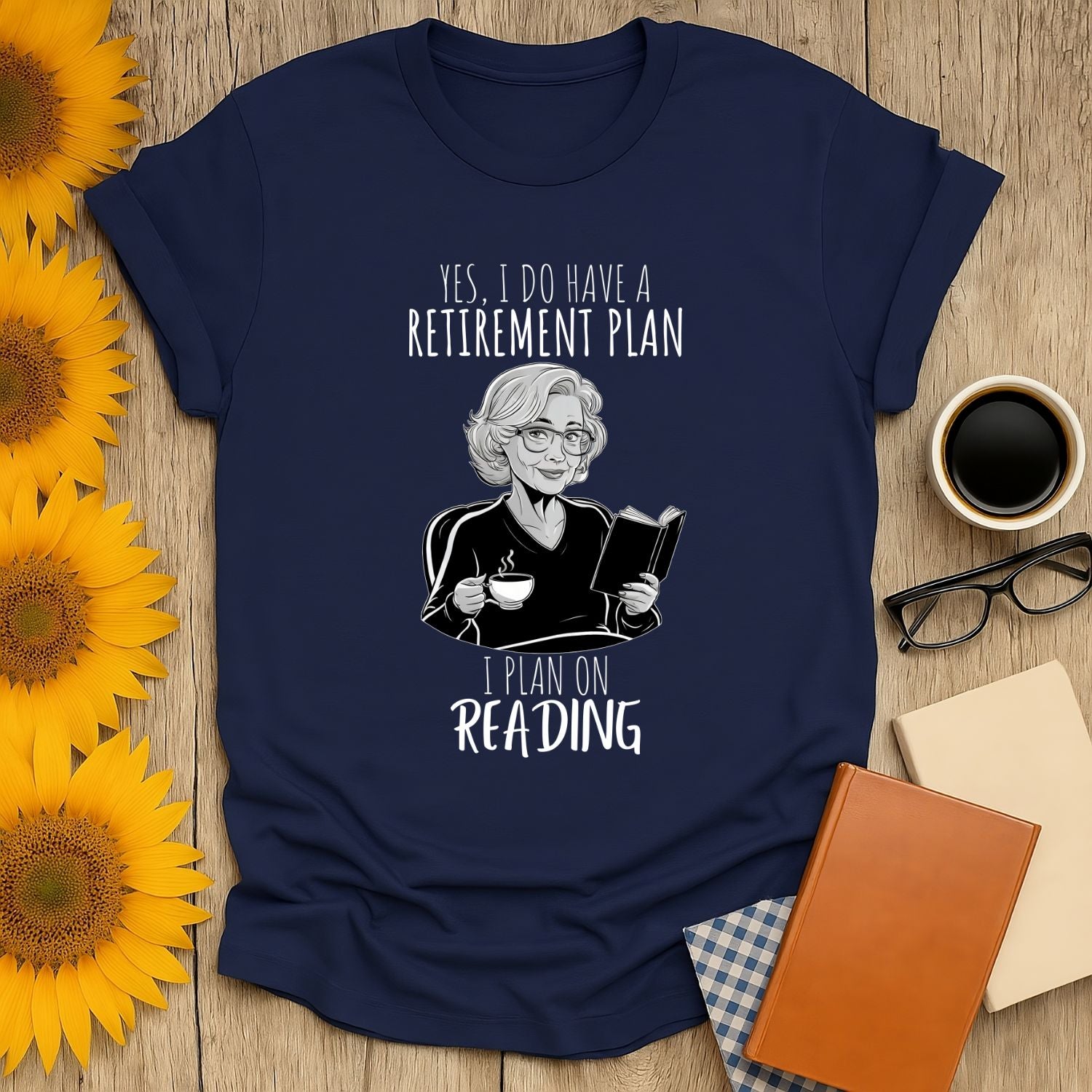 Funny retirement plan t-shirt with a smiling woman holding a book and coffee, perfect for cozy book lovers and gifts for readers.