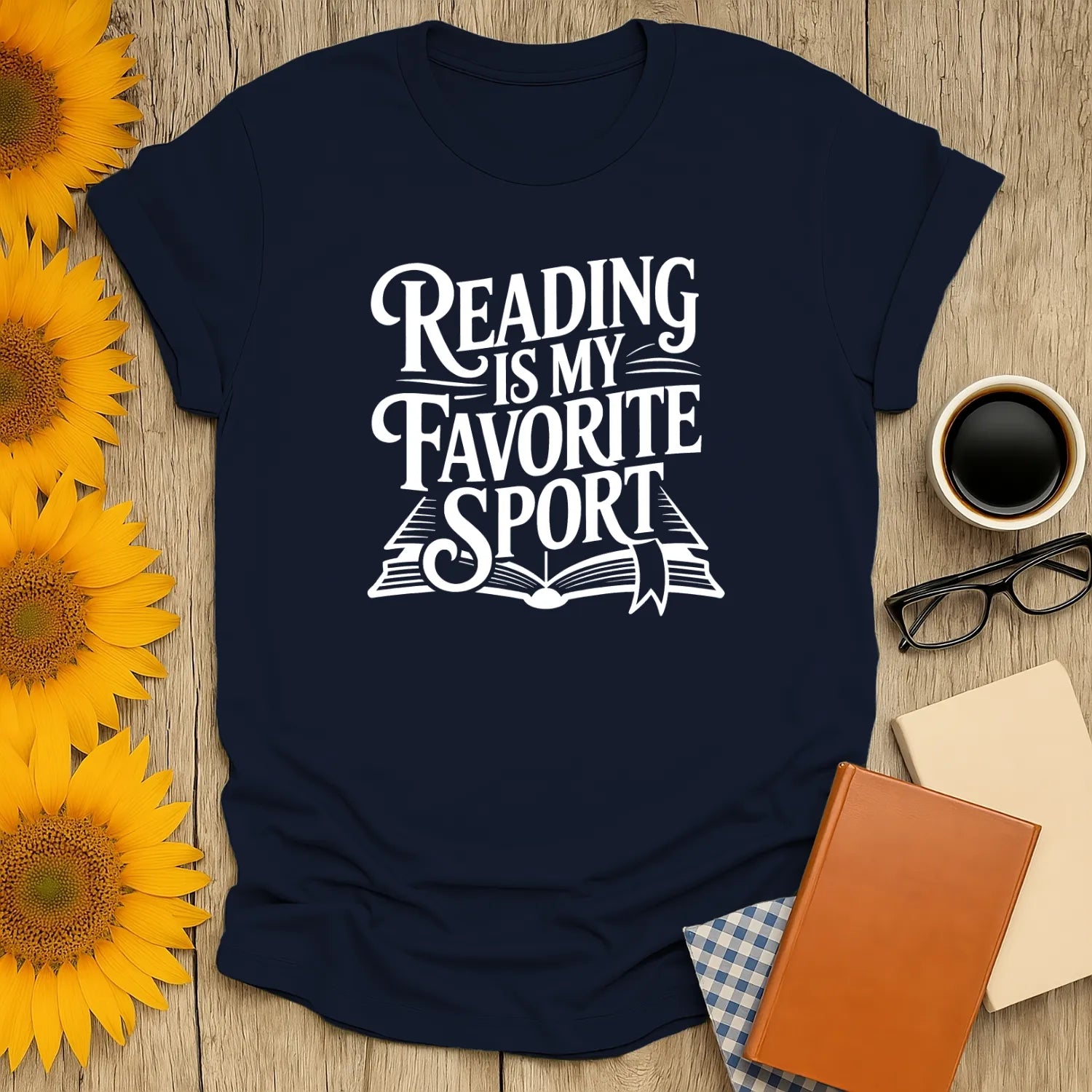 Book lover shirt featuring "Reading is My Favorite Sport" in playful lettering, perfect gift for cozy readers.