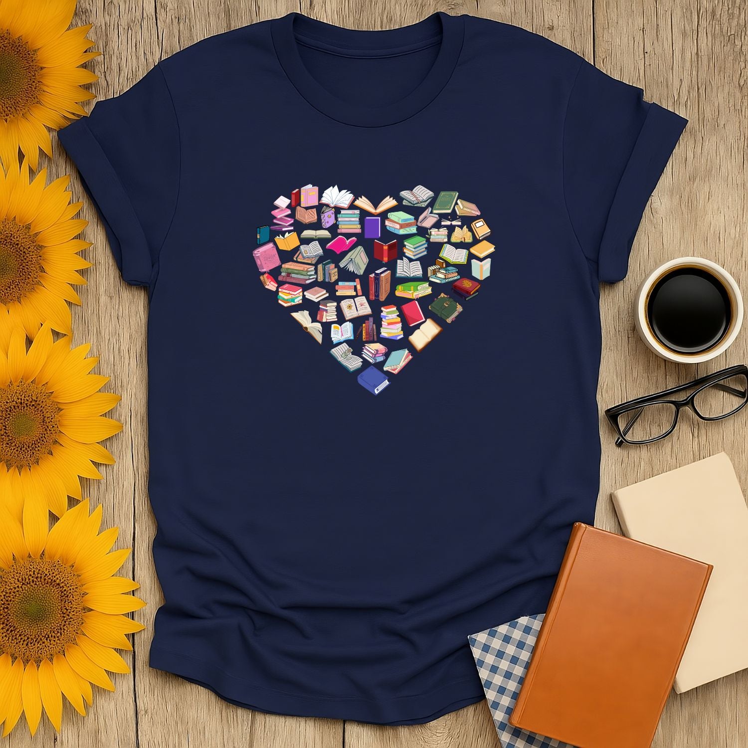 Heart-shaped graphic of colorful books on a navy tee, perfect gift for book lovers, cozy reading vibes.