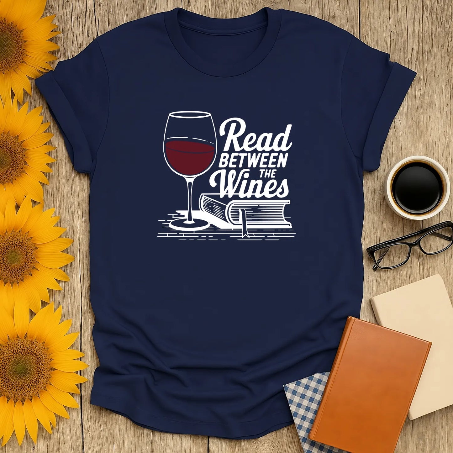 Read Between the Wines T-Shirt, relaxed fit unisex shirt for book lovers, featuring wine glass & open book, perfect gift for readers 📖.