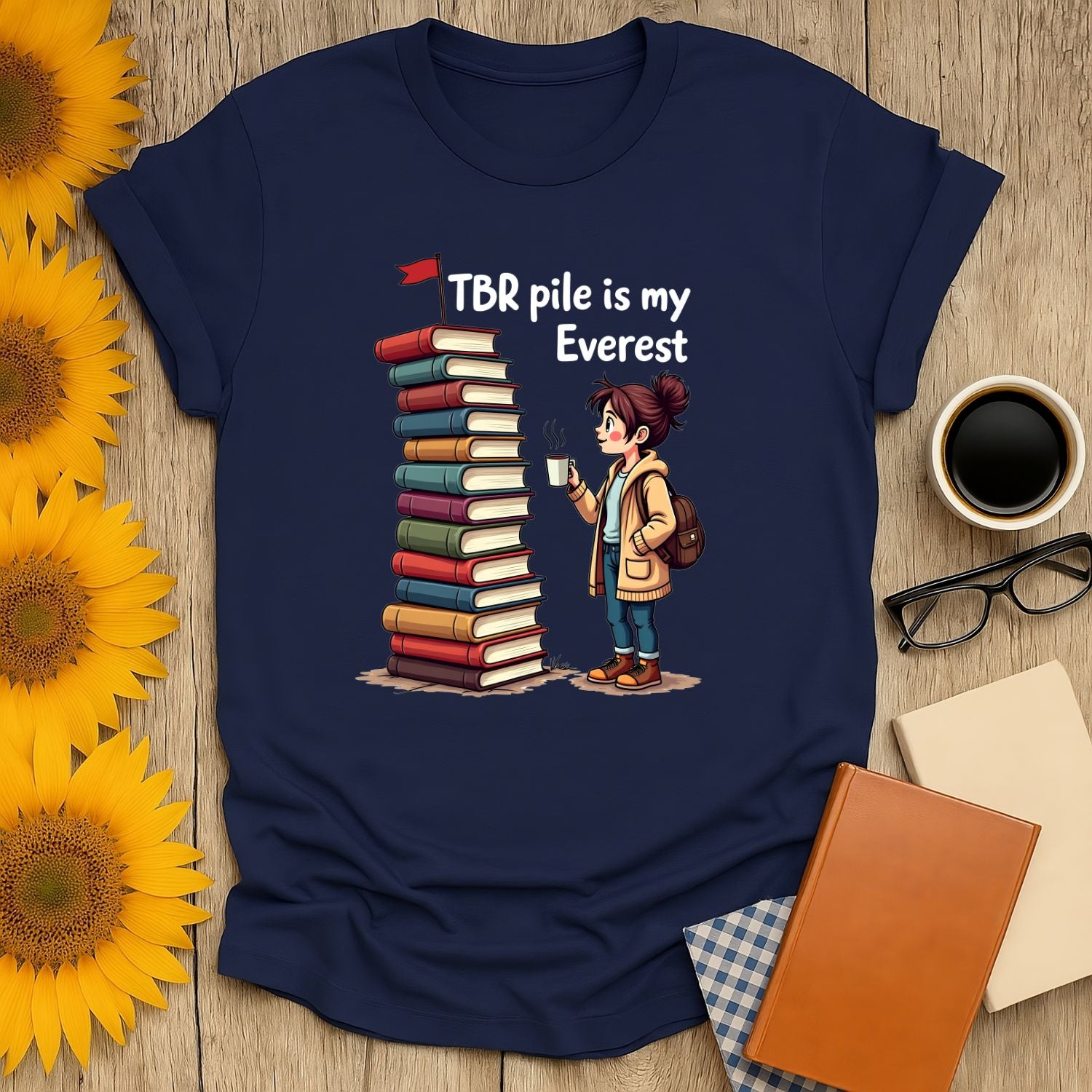 Bookish Everest T-Shirt featuring a girl with a stack of books, perfect for book lovers and reading enthusiasts.