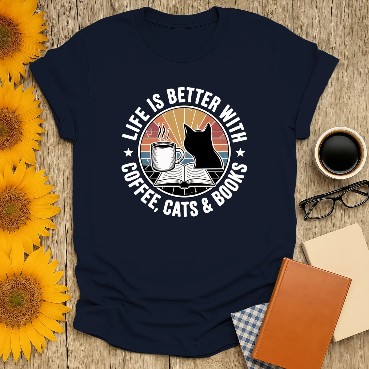 Cute navy shirt with cat, coffee, and open book design; perfect gift for cozy book lovers and readers.