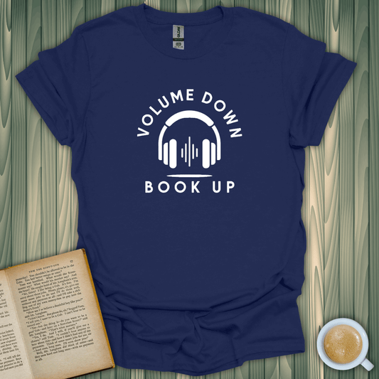 Volume Down Book Up T-Shirt for book lovers, featuring a headset design on a navy background, made of soft cotton.