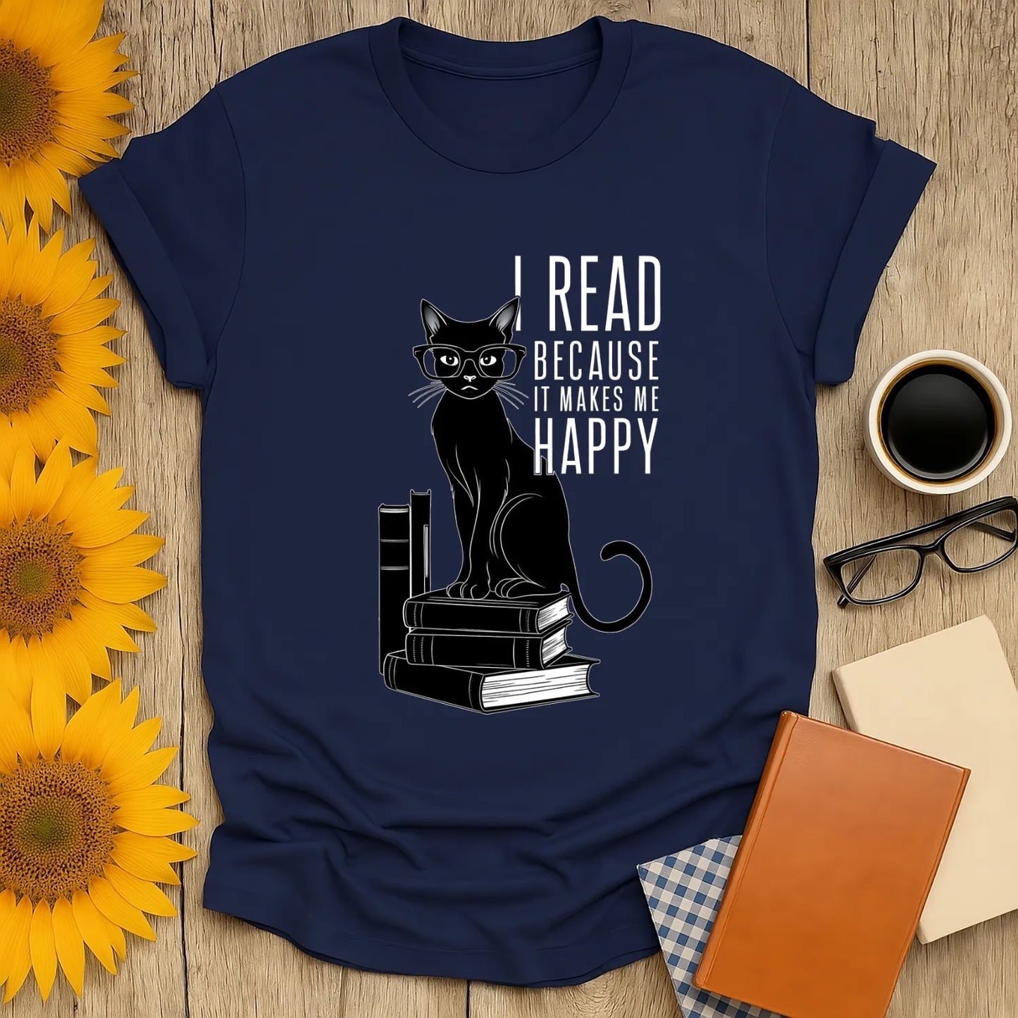Funny reading tee featuring a stylish cat in glasses atop books with the text 'I read because it makes me happy'.