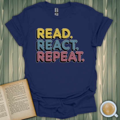 Unisex navy t-shirt featuring "Read. React. Repeat." design, perfect for book lovers. Made of 100% ring-spun cotton.