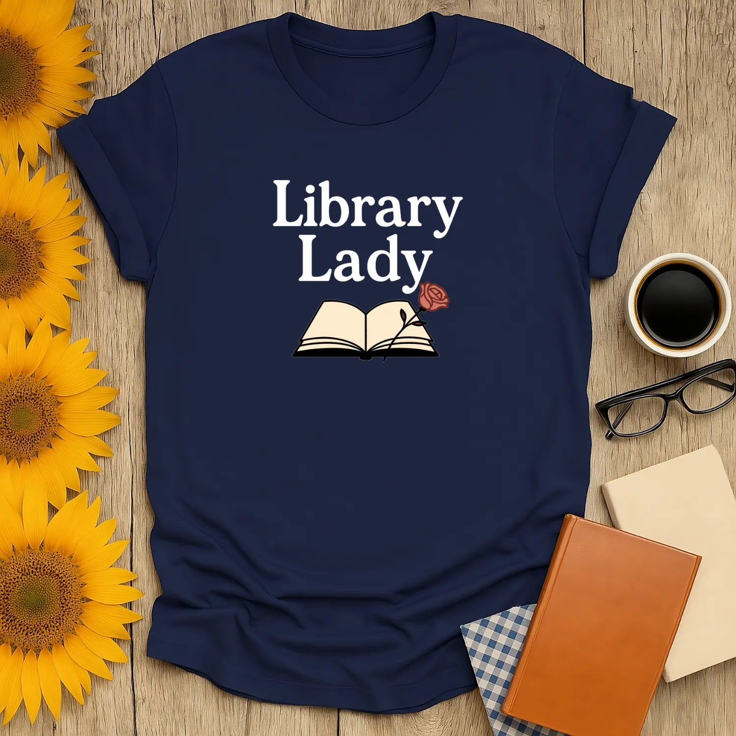 Library Lady t-shirt featuring an open book with a rose, perfect for book lovers who enjoy cozy reads, cats, and coffee.