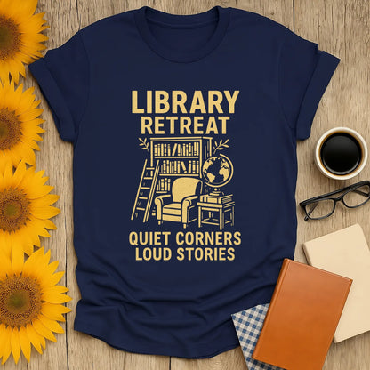 Cozy Library Retreat tee with a reading nook and globe, perfect for book lovers and a great gift for tea and cat enthusiasts.
