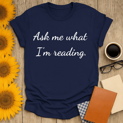 Ask Me T-Shirt for book lovers, featuring a stylish design on navy fabric, perfect for expressing your reading passion.