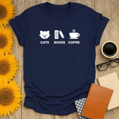 Navy Holy Trinity T-Shirt with white icons: smiling cat, book, coffee cup. Perfect for book lovers and cozy readers!