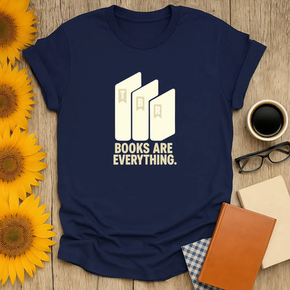Bold blue book lover shirt featuring stacked books and the text 'BOOKS ARE EVERYTHING'—a perfect gift for cozy reading fans.