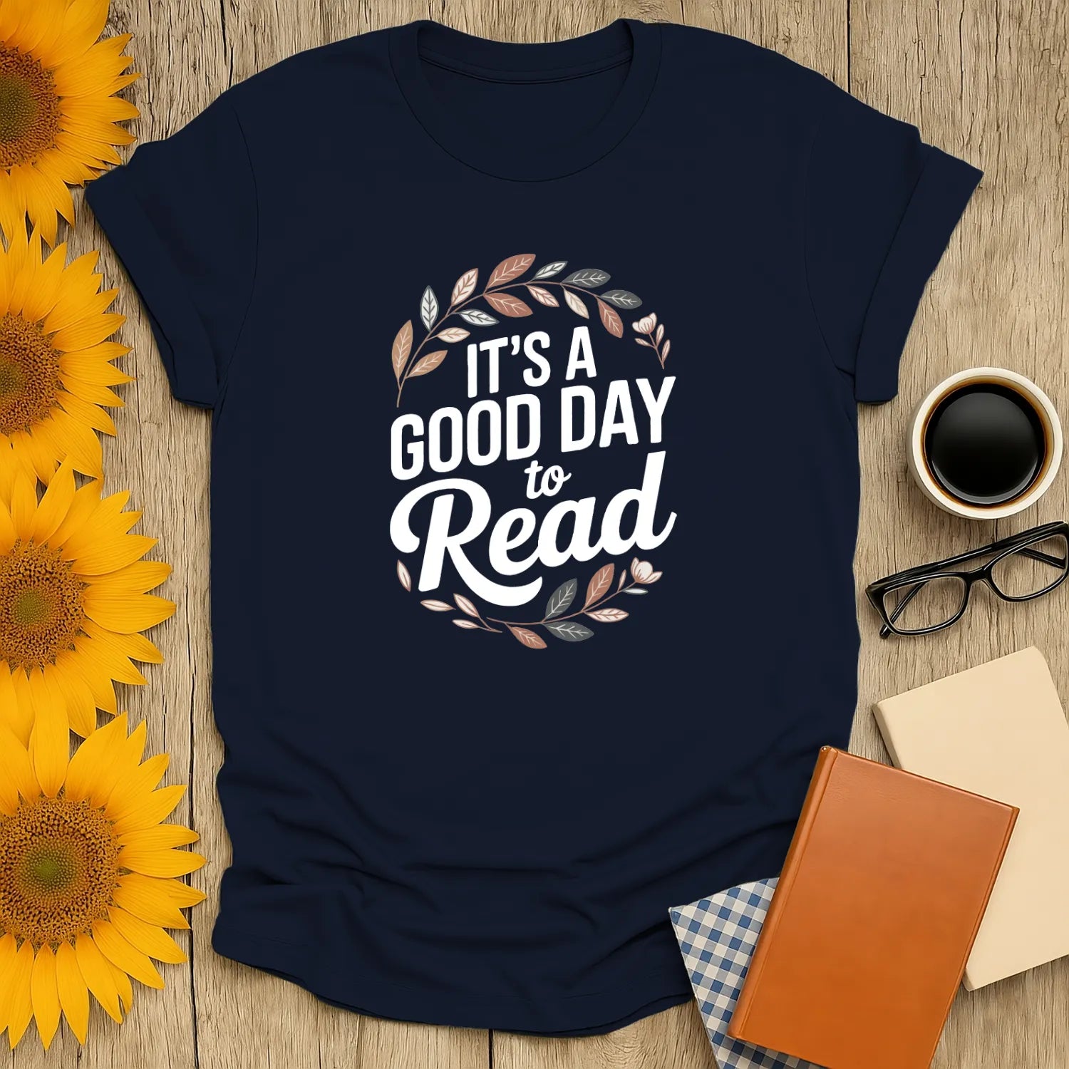 Cozy navy book lover shirt with 'It's a Good Day to Read' surrounded by leafy design, perfect for coffee and cat fans.
