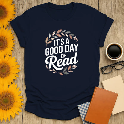 Cozy navy book lover shirt with 'It's a Good Day to Read' surrounded by leafy design, perfect for coffee and cat fans.