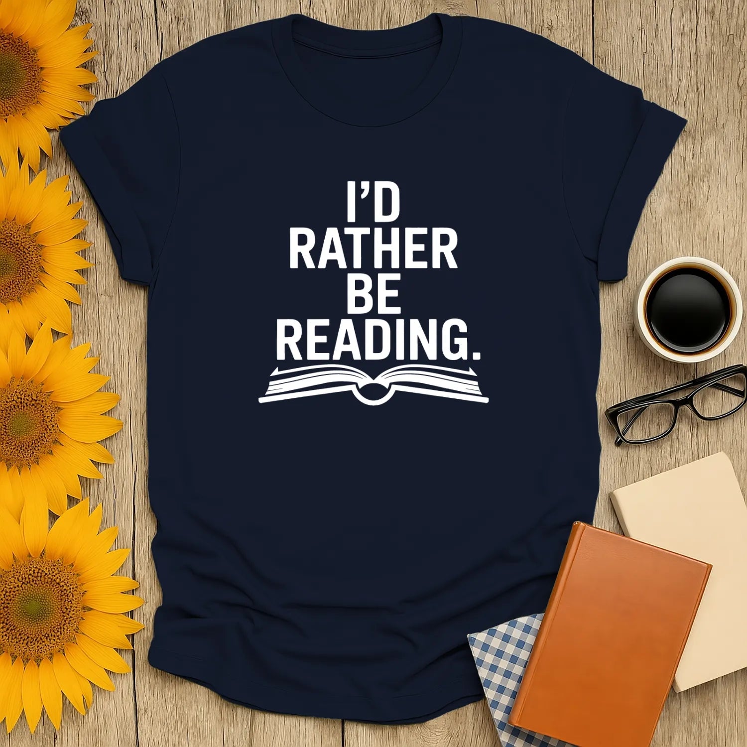 Navy blue shirt with 'I’d Rather Be Reading' text and an open book illustration, perfect gift for cozy book lovers.