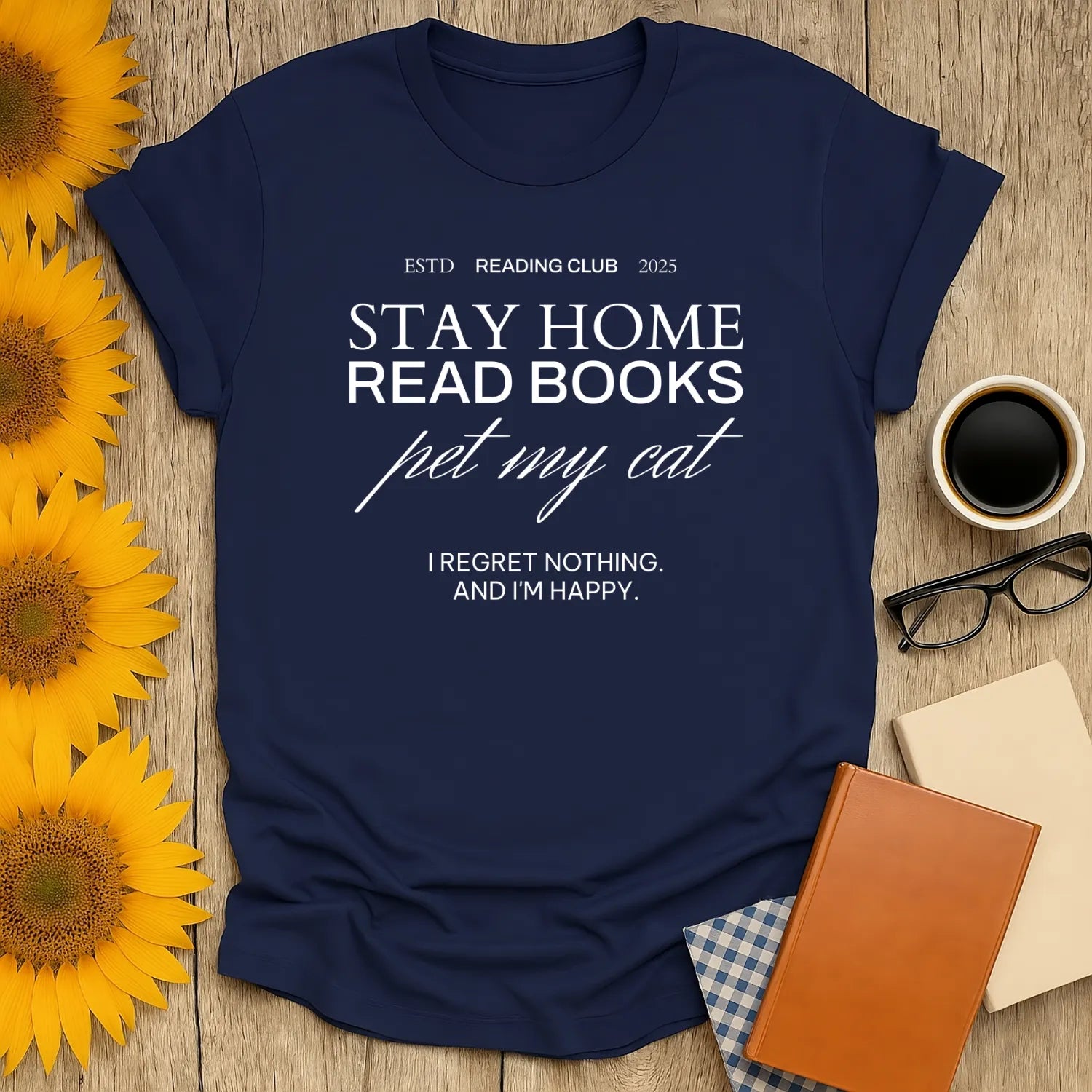 Reading Club Motto T-Shirt with humorous text: 'Stay Home Read Books Pet My Cat. I Regret Nothing. And I'm Happy.' Perfect for cozy book lovers.