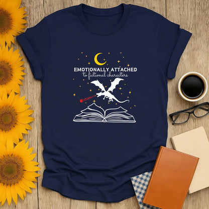 Unisex navy book lover shirt with a dragon, open book, and text: "Emotionally Attached to Fictional Characters." Perfect gift for readers!