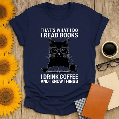 Navy Coffee & Cat Wisdom T-Shirt for book lovers, featuring a cat in glasses. Soft, breathable cotton with screen print design.
