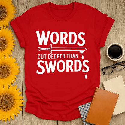 Words Cut Deeper Than Swords t-shirt for book lovers, made from breathable ring-spun cotton, unisex fit, vibrant red design.