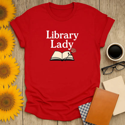 Library Lady T-shirt in red featuring an open book and rose, perfect for book lovers who adore cozy reading moments.