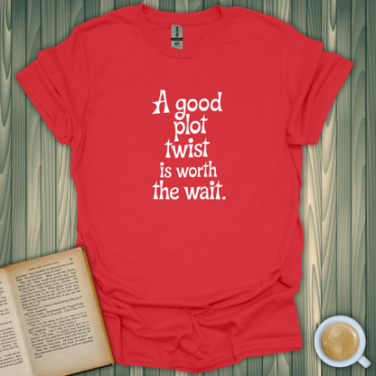 Red t-shirt with 'A good plot twist is worth the wait' design, perfect for book lovers, made of soft cotton.