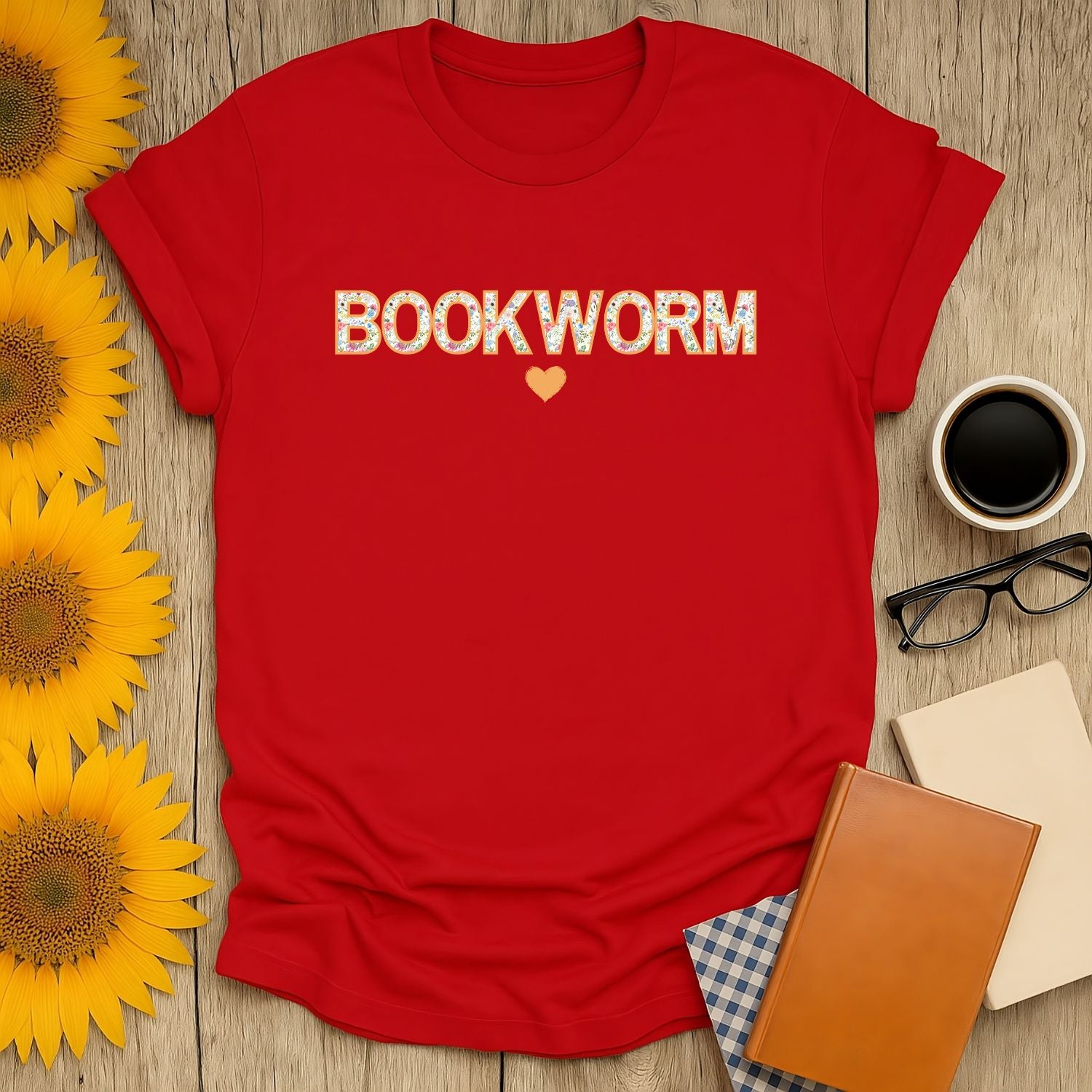 Red 'BOOKWORM' t-shirt with heart, perfect for witty book lovers. Ideal gift for readers, coffee, and cat enthusiasts.