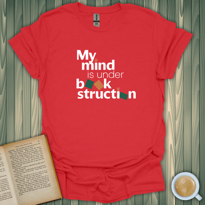 My mind is under book-struction T-Shirt on red fabric; perfect for book lovers, made from 100% ring-spun cotton.