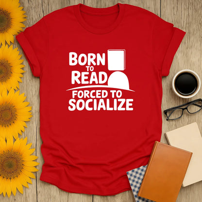 Born to Read t-shirt with humorous text 'Born to Read, Forced to Socialize' on a vibrant red shirt, perfect for book lovers.