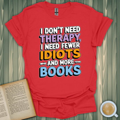 Less Idiots More Books T-Shirt for book lovers, crafted from soft, breathable cotton, featuring a colorful design.