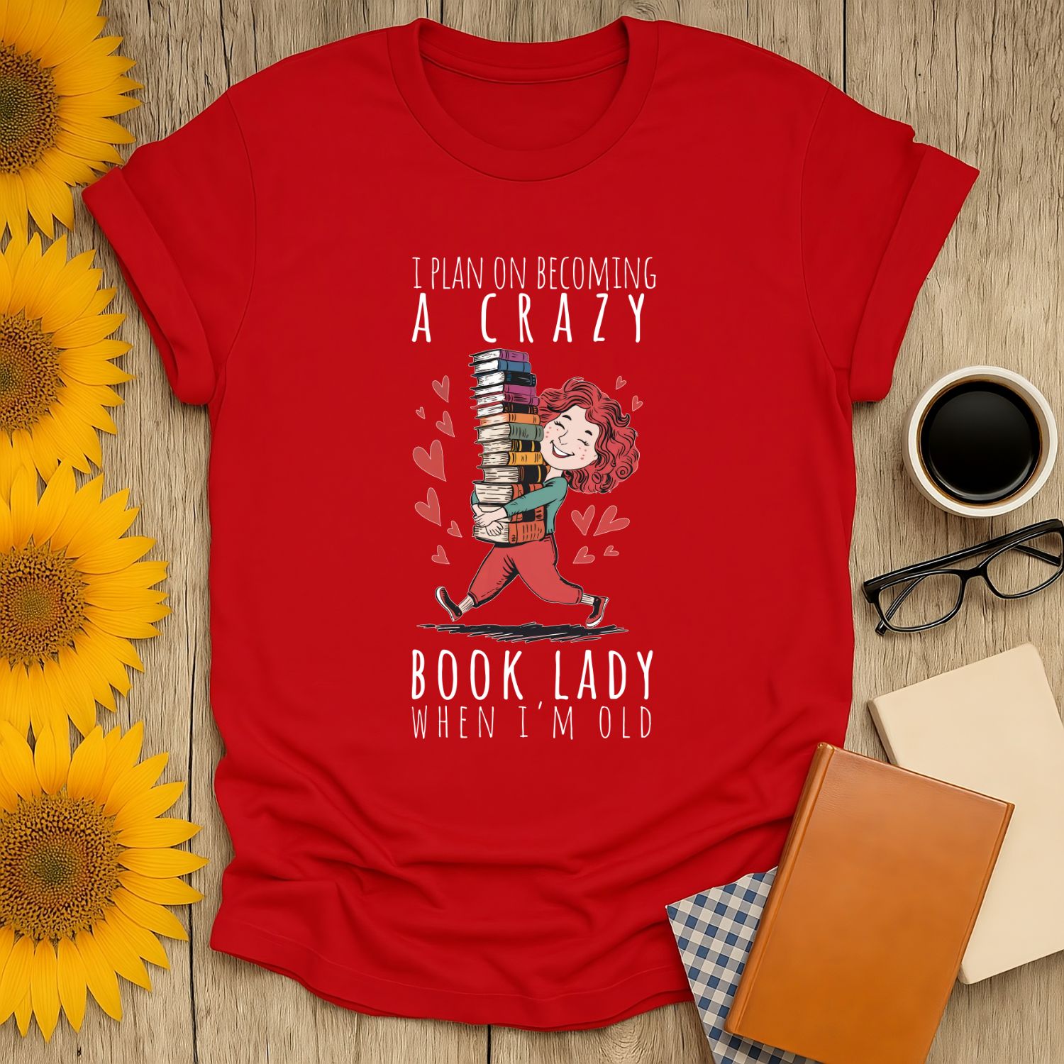 Red unisex t-shirt for book lovers with fun graphics and text about becoming a crazy book lady when old.