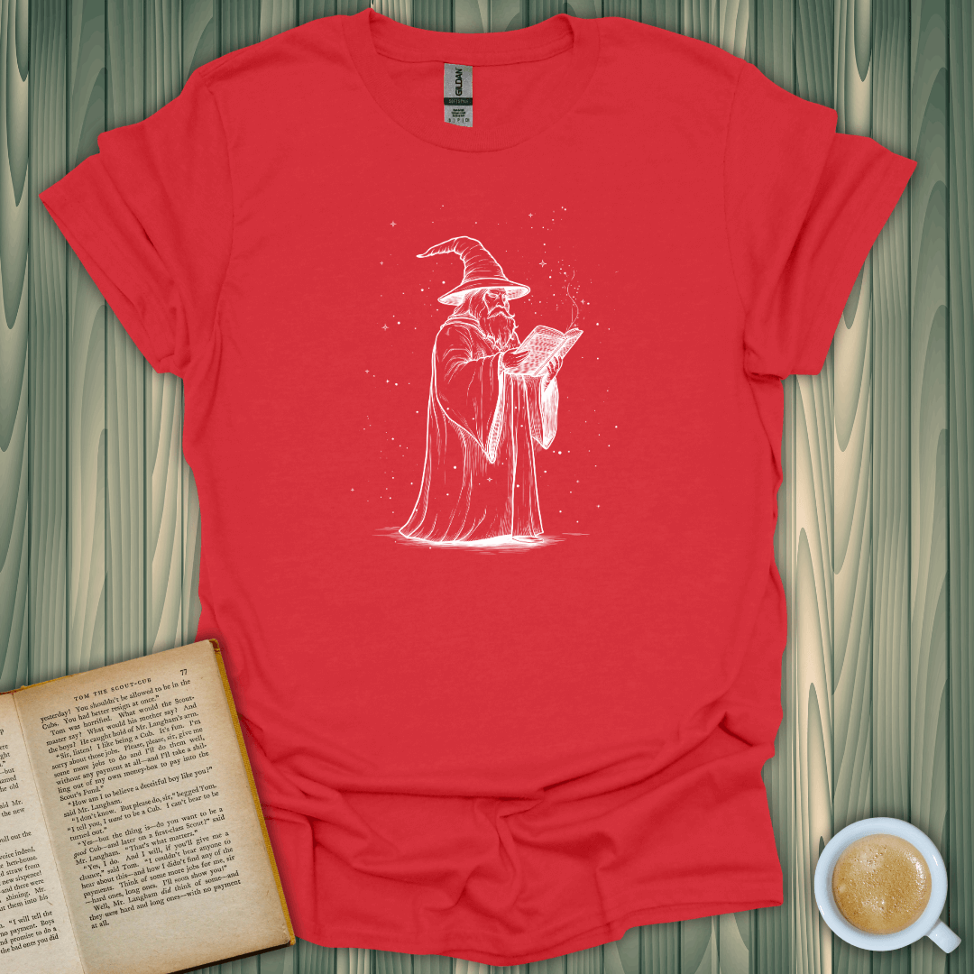 The Wizard's Grimoire T-Shirt for book lovers, featuring a wizard reading a spellbook in white on a red tee.