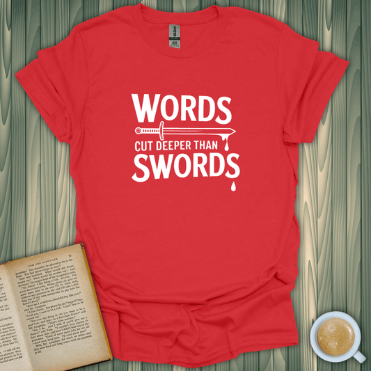 Red t-shirt with 'Words Cut Deeper Than Swords' design; perfect for book lovers.