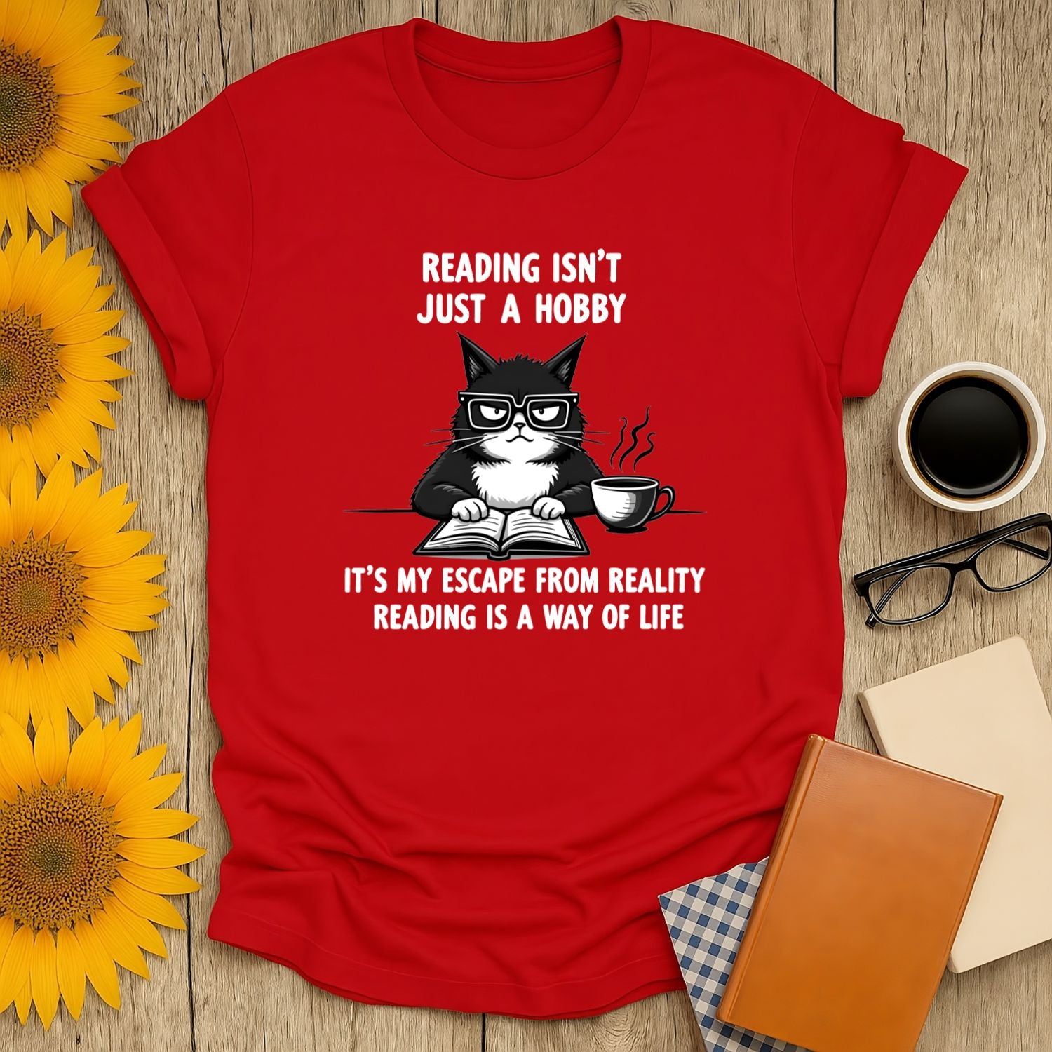 Grumpy book cat t-shirt featuring a playful quote, perfect for book lovers, made from soft, breathable fabric.